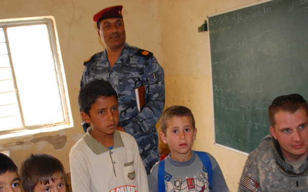 Iraqi Emergency Response Unit and US Soldiers Support Local Schools