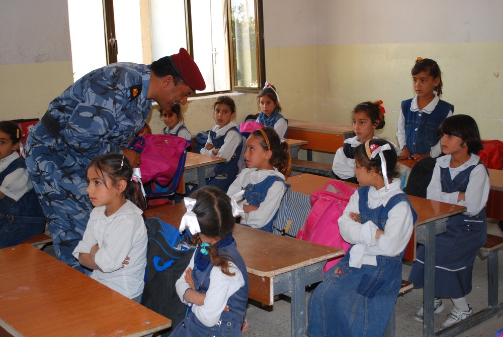 Iraqi Emergency Response Unit and US Soldiers Support Local Schools