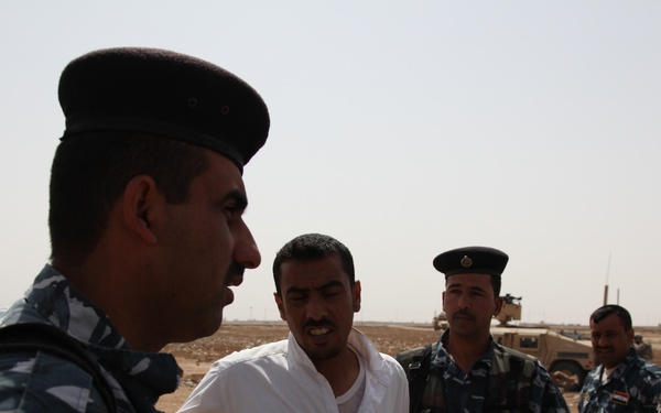 Soldiers react to sniper fire