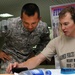 Olympians Share Medals With Troops Overseas