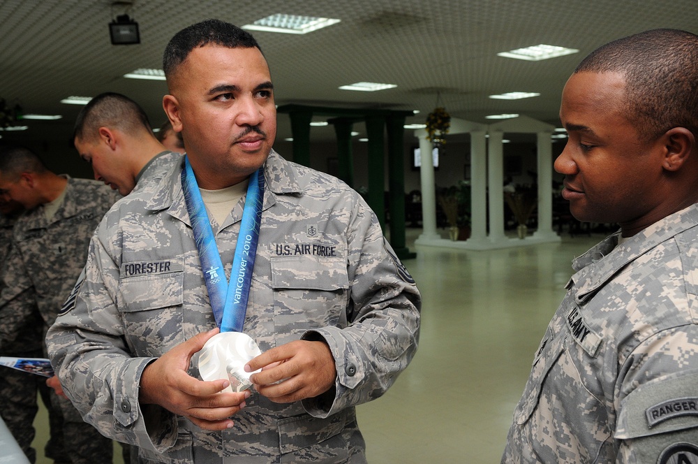 Olympians Share Medals With Troops Overseas