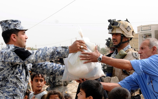 Iraqi, American forces provide needed supplies to local populace