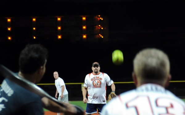 Service members play baseball