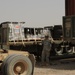Soldiers track trailers at transfer point