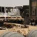 Soldiers track trailers at transfer point