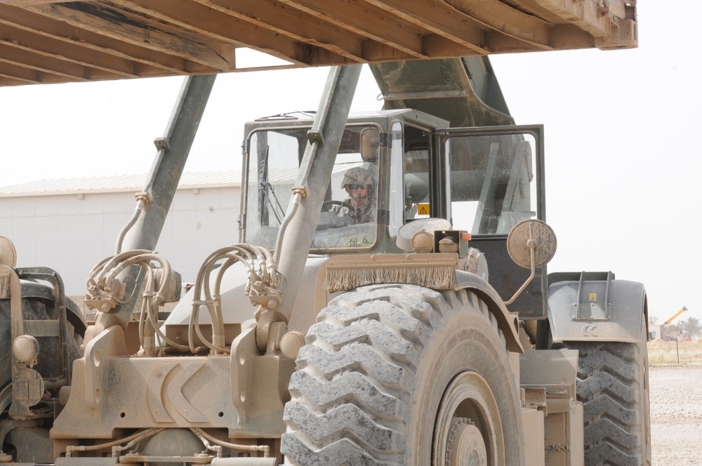 Rough Terrain Container Handler operators manage container yard