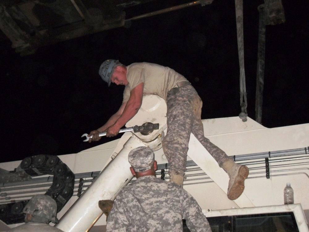 Quartermaster Company Mechanics Assemble Container Stacker