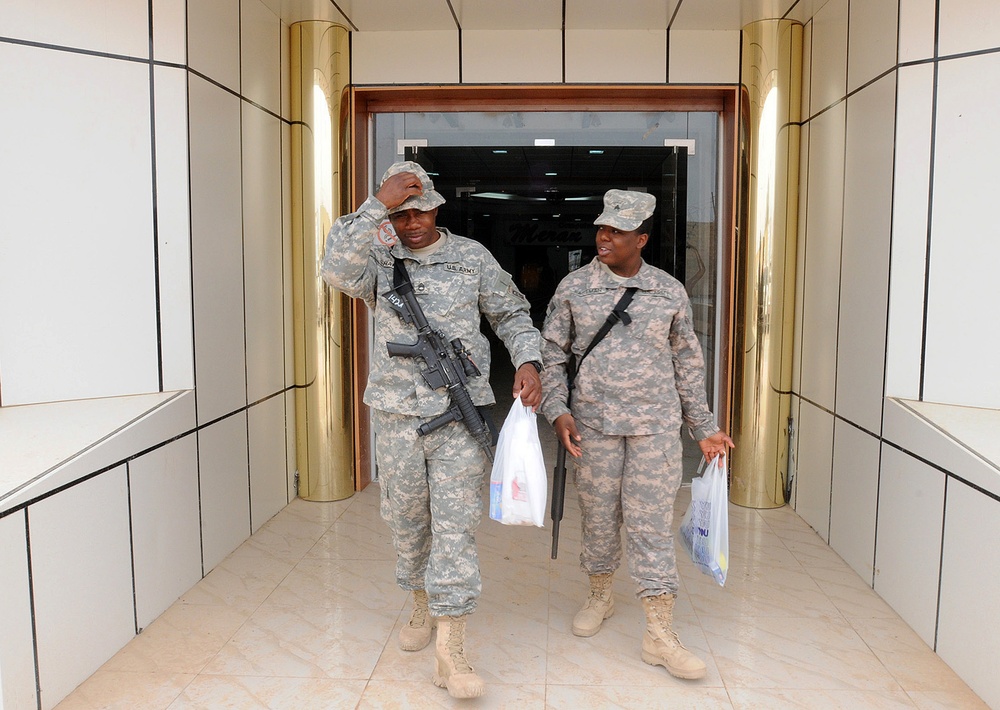 Daddy's girl visits 1/82 Advise and Assist Brigade non-commissioned officer while in Iraq