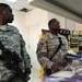 Daddy's girl visits 1/82 Advise and Assist Brigade non-commissioned officer while in Iraq