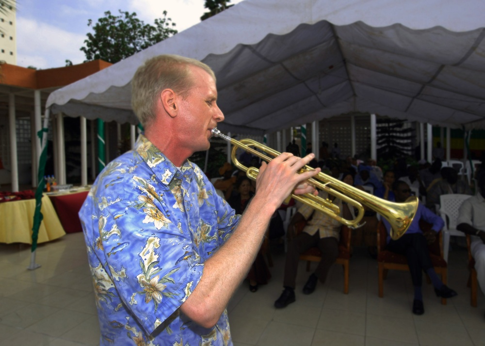 Sailors perform for locals