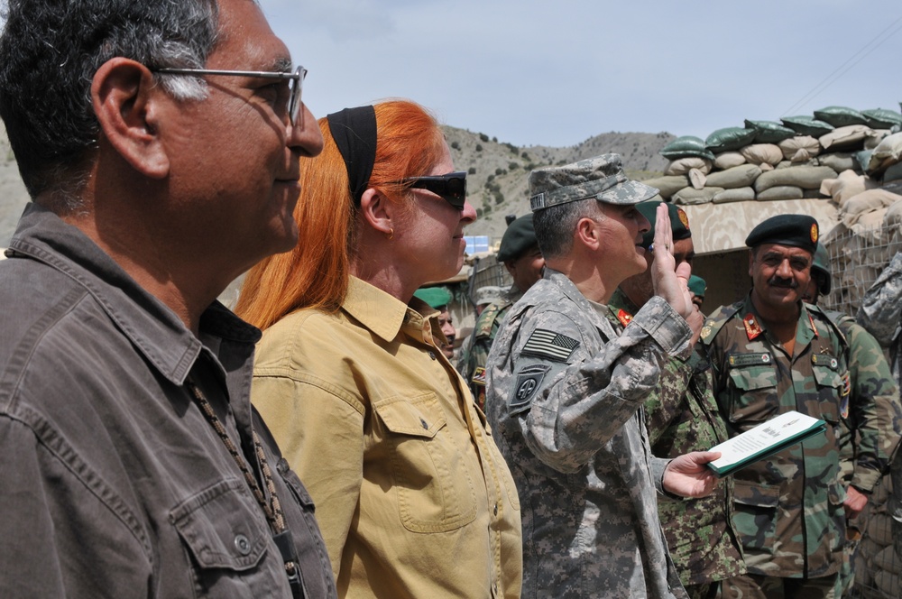 Four Stars and Two Parents Make for a Special  Re-enlistment Ceremony in Afghanistan