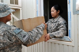 Neither rain, nor sandstorm, nor heat...DSTB mail orderlies deliver hope