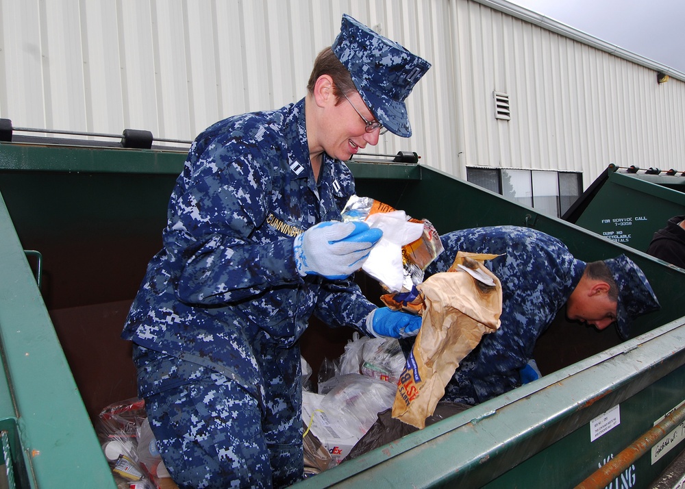 an annual dumpster dive supporting Earth Day