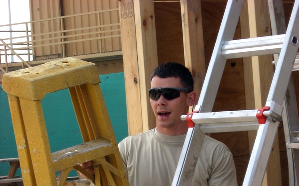 Camp Vance chaplain's assistant constructs forging shop