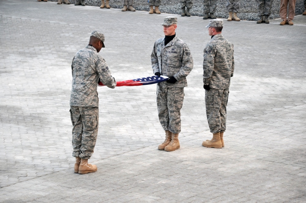 380th Renders a Salute to the American Flag