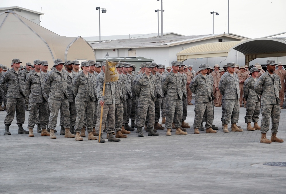 380th Renders a Salute to the American Flag