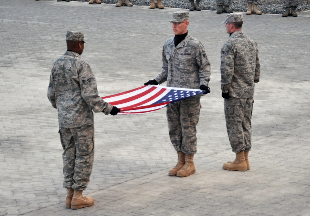 380th Renders a Salute to the American Flag
