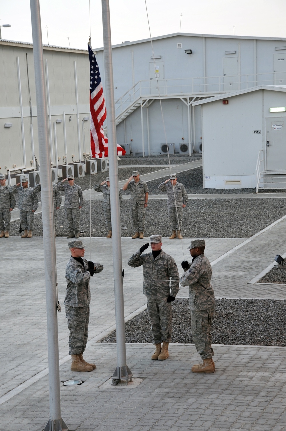 380th Renders a Salute to the American Flag