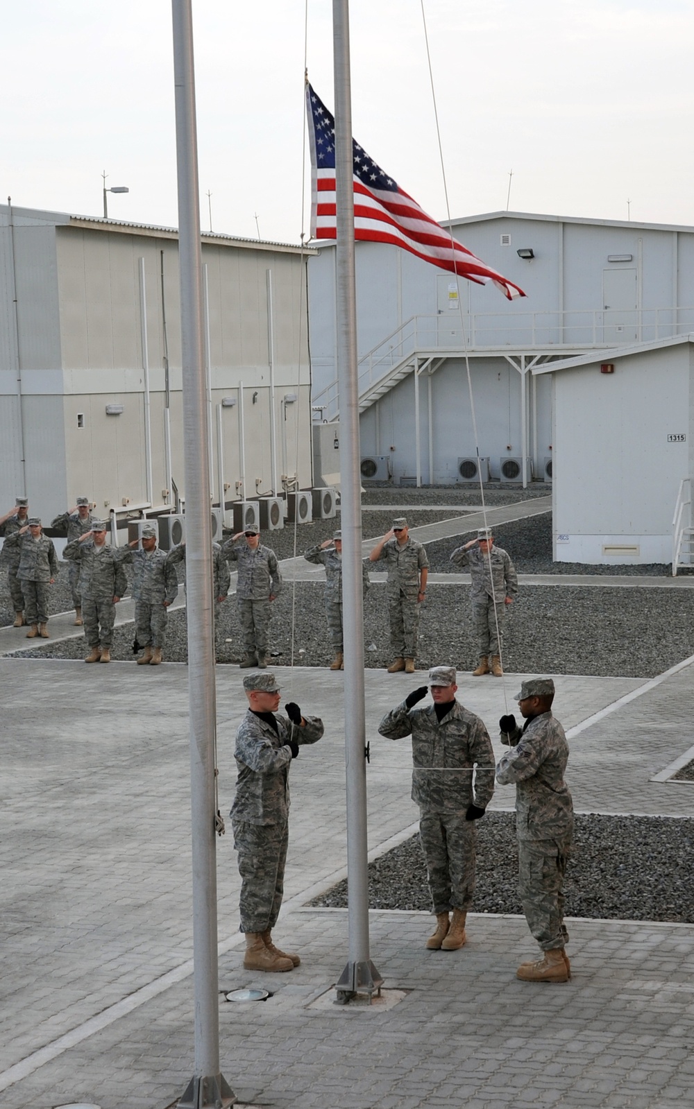 380th Renders a Salute to the American Flag