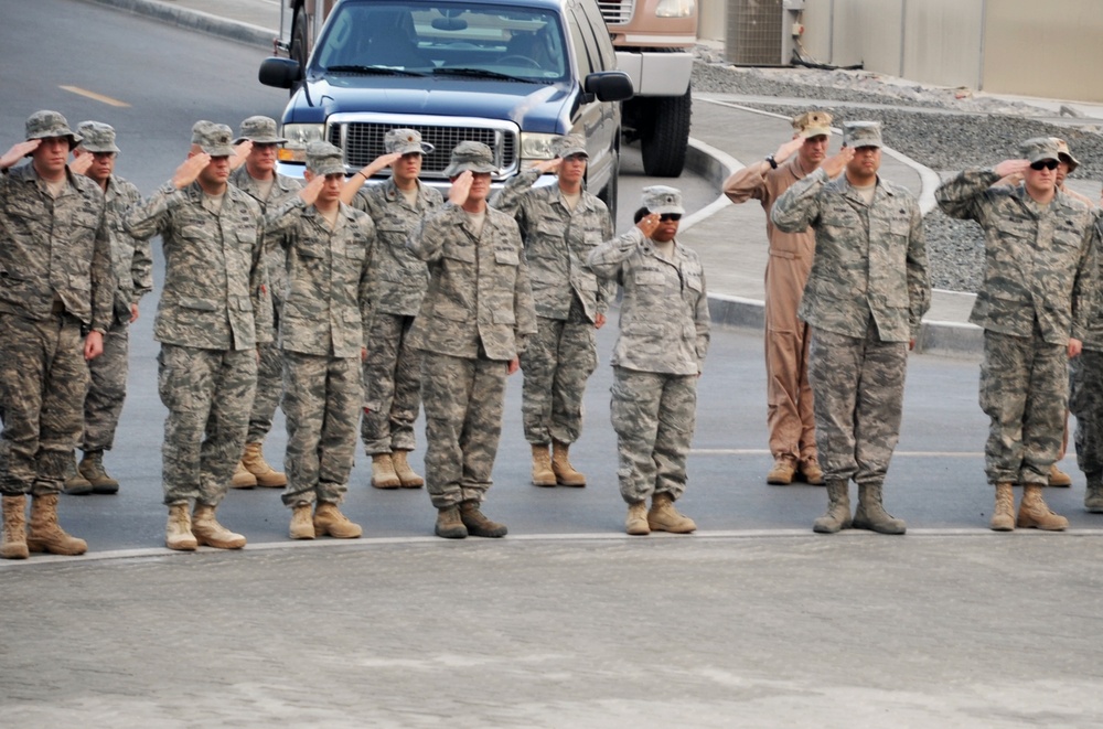 380th Renders a Salute to the American Flag