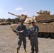 Air Force colonel re-enlists Airmen on Army tank