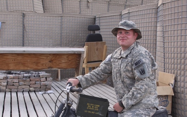 Spc. Fixes Bike in Ghazni