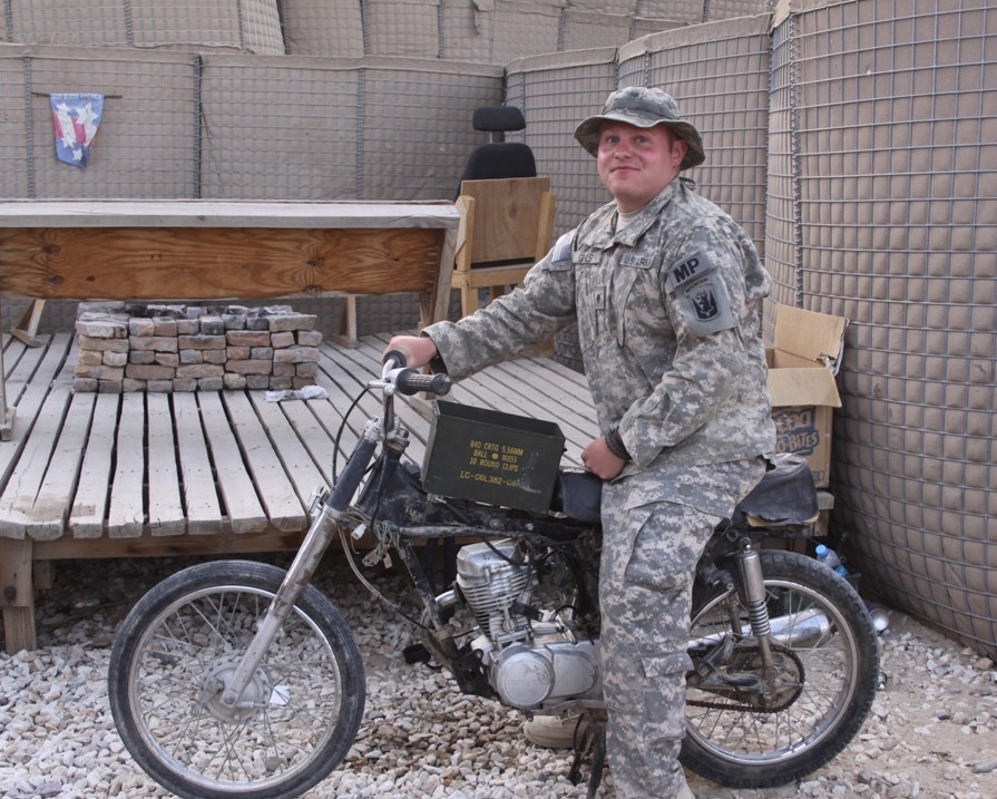 Spc. Fixes Bike in Ghazni