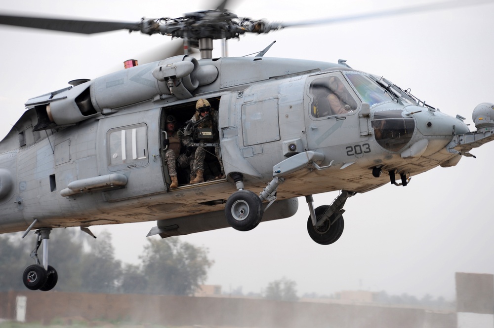 helicopter assault force training aboard an HH-60H Sea Hawk helicopter