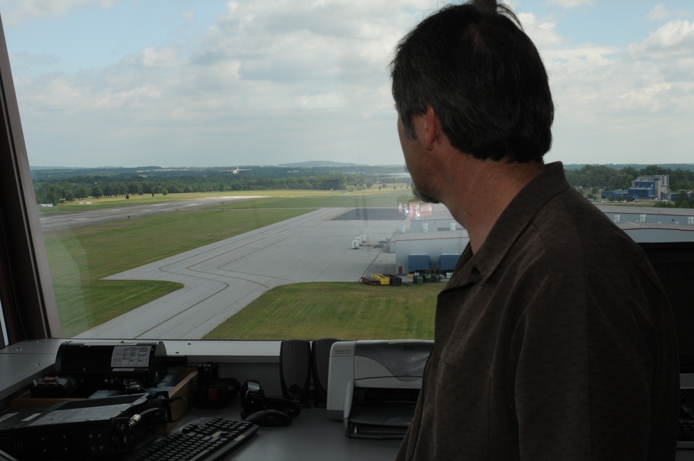 An Air Traffic Controller at South Carolina Technology and Aviation Center Guides a MAFFS Aircraft in (Photo by Staff Sgt. Richard Kerner)