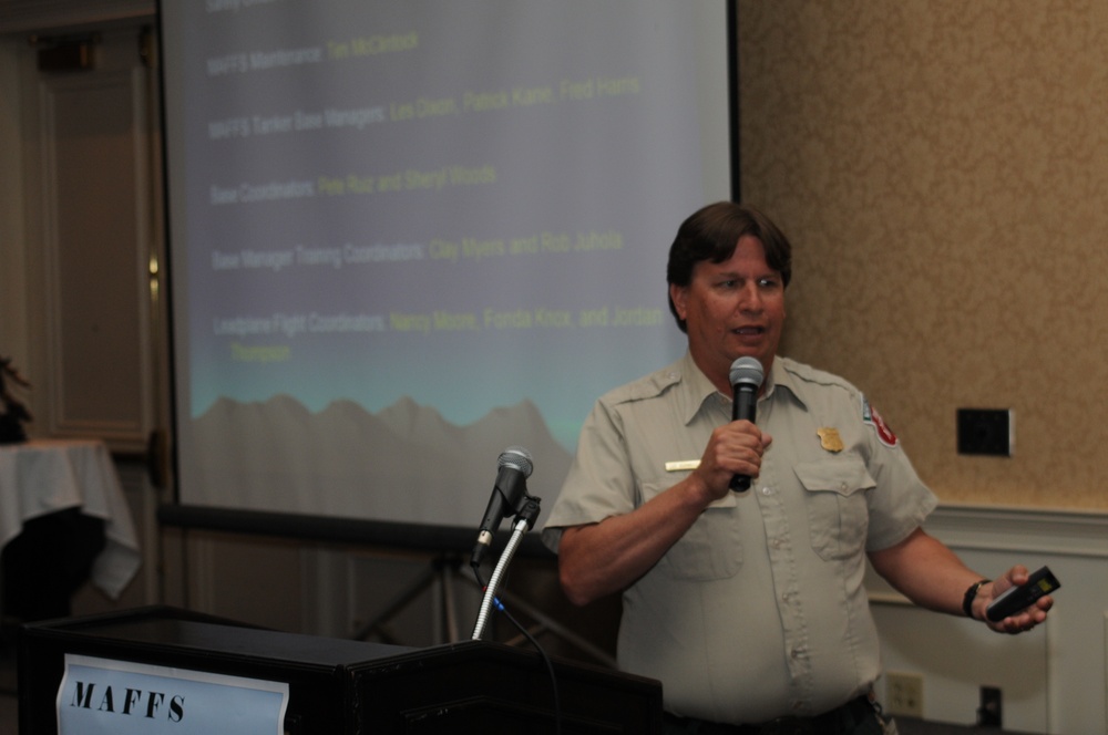 MAFFS Liaison Officer Lee Burwell Provides Training Objectives to the Audience During the Welcome Briefing  (Photo by Staff Sgt. Richard Kerner)