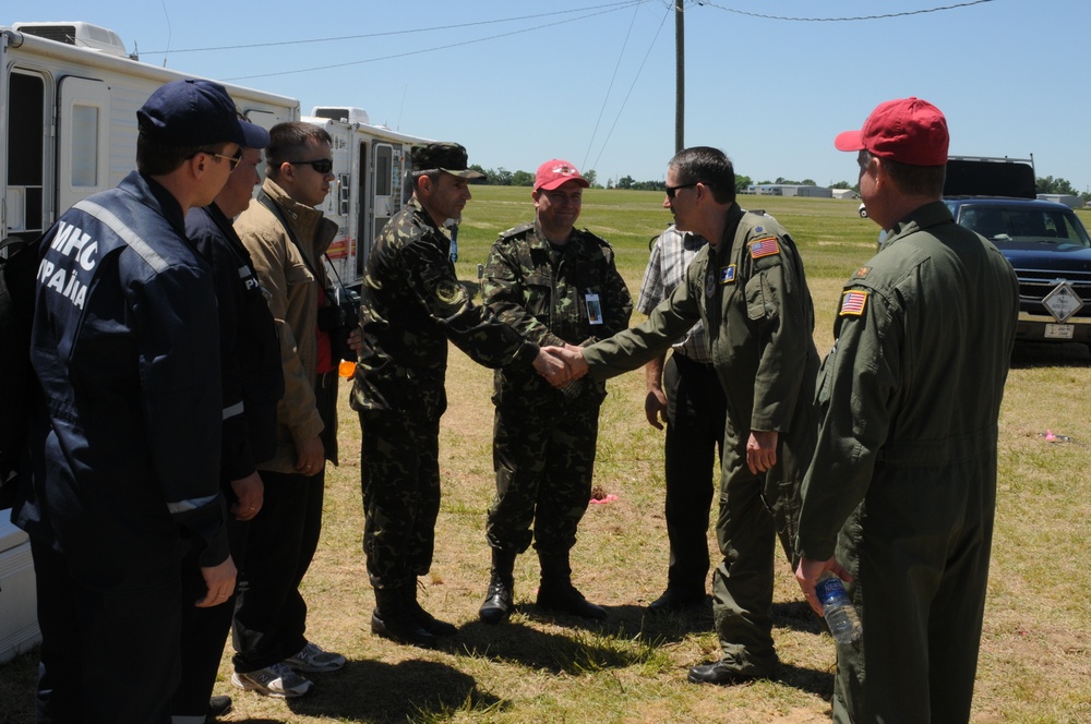 Lt. Col. Dennis Bailey of the North Carolina Air National Guard Introduces Himself to Ukraine Officials Observing the MAFFS Training Exercise in Greenville, SC.