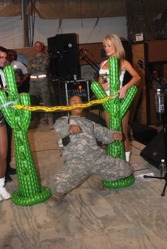 Hooters girls bring troops music, laughs