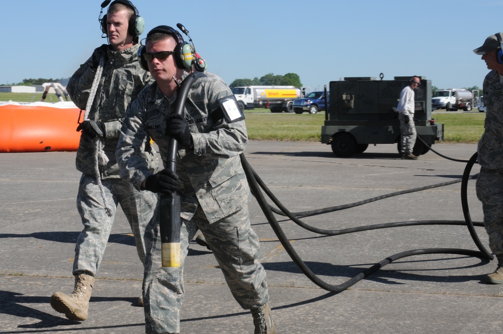 Maintenance Technicians From the 145AW, North Carolina Air National Guard Service and Reload an Aircraft Preparing for Another MAFFS Training Mission in Greenville, SC.