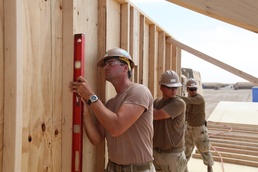 Sea Bees build up from the ground up:Sea Bees swarm Delaram II with construction
