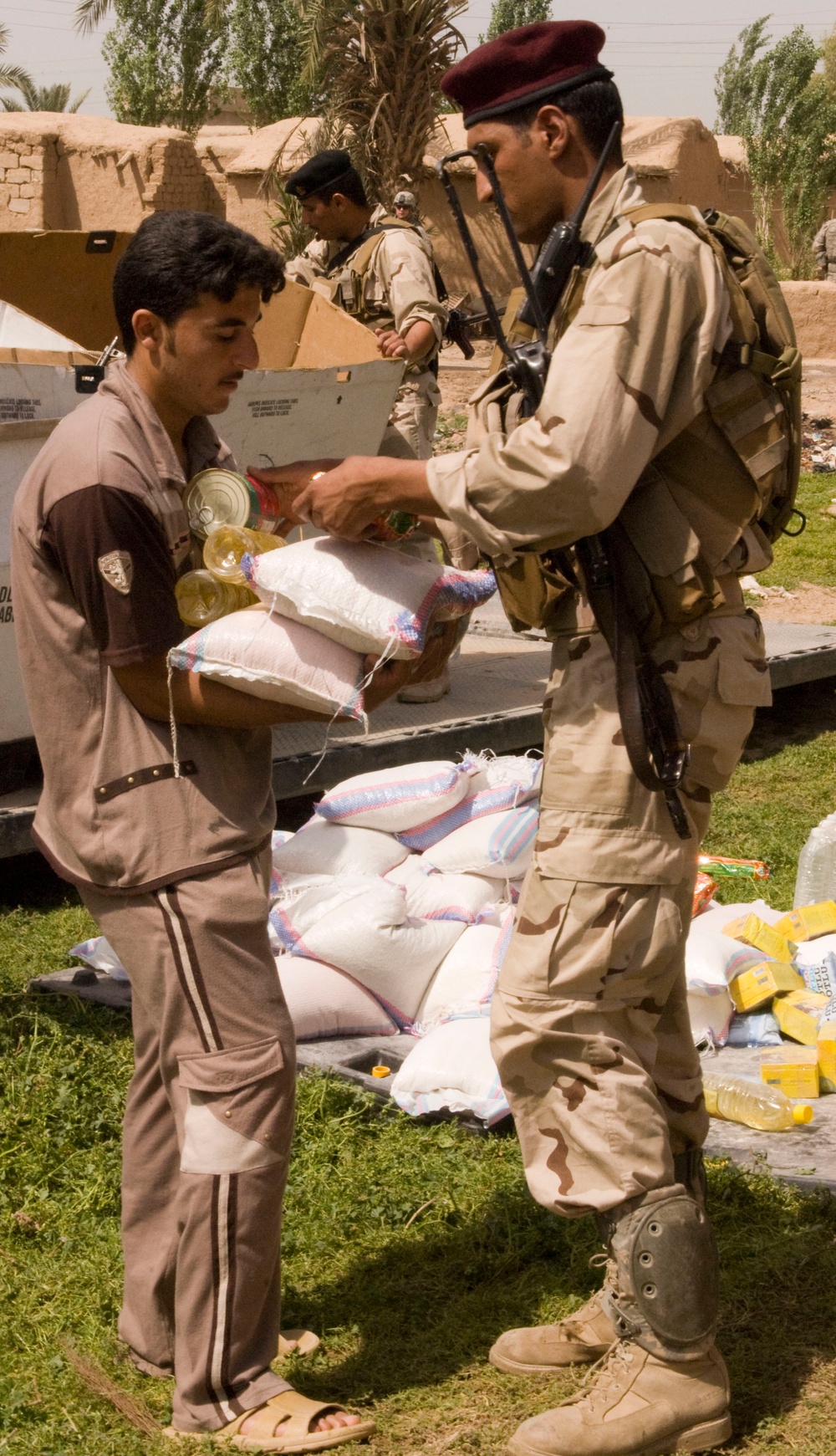 IA, Texas Soldiers Provide Humanitarian Aid to Farmers