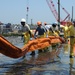 Workers at a Decontamination Site in Venice, La., Carry Oil Containment Boom