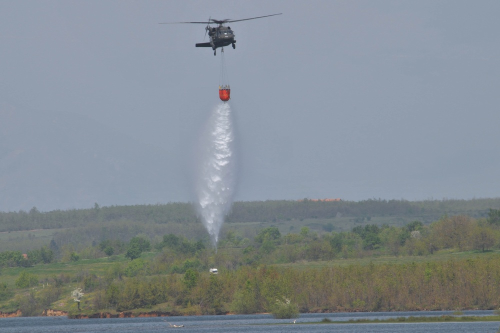 KFOR Soldiers train on 'Bambi Bucket' to fight fires in Kosovo
