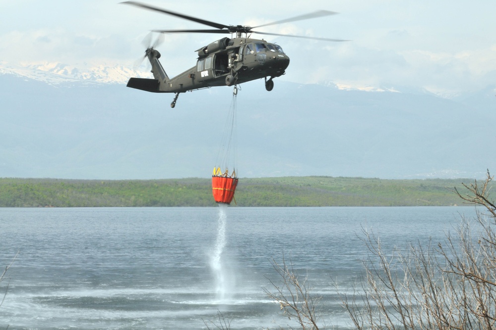 KFOR Soldiers train on 'Bambi Bucket' to fight fires in Kosovo