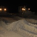 Louisiana National Guard's work around the clock bulldozing sand to close a strait between two peninsulas in Grand Isle