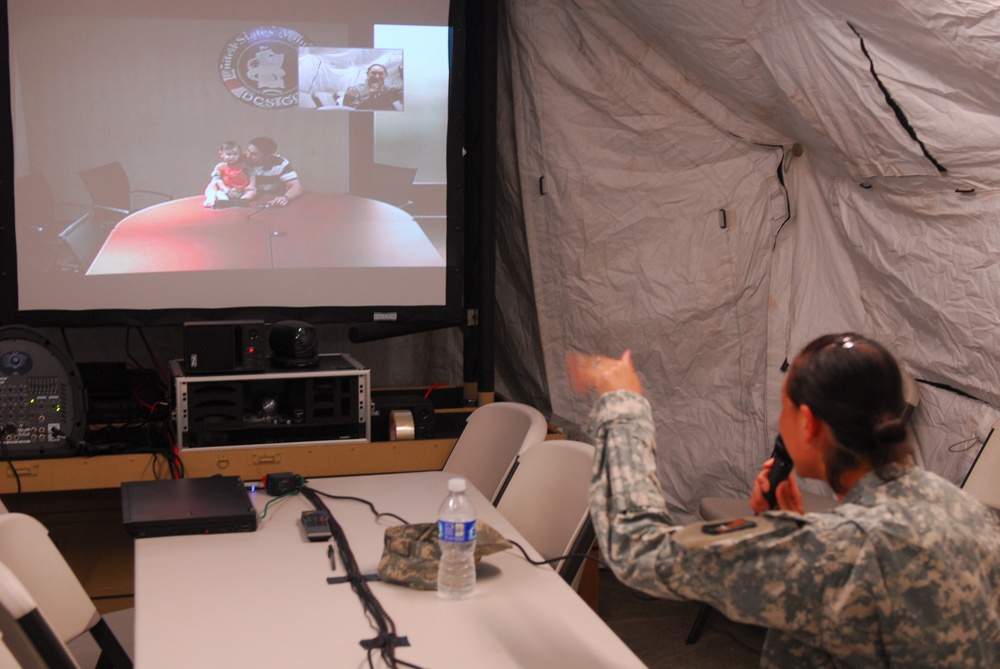 Families talk face-to-face miles apart