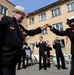 Chief Petty Officer Roszetta Dean, yeoman, dances with a Russian veteran to music of the U.S. 7th Fleet Band at a veteran's center in Vladivostok, Russia. Blue Ridge and the embarked U.S. 7th Fleet staff Sailors visited the center as part of a community o