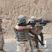 Service members fire weapons