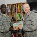 Nellis Spouse Group Donates Children's Books for Deployed Wing's Reading Program