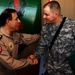 Soldier provides unique example to Iraqi military at re-enlistment