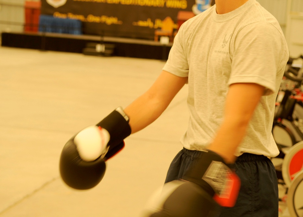 Air Weapons Officer Throws Punches in the Ring, in the Sky
