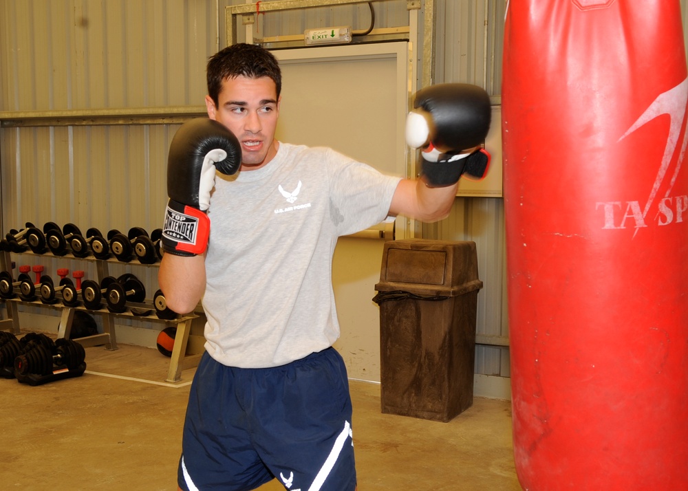 Air Weapons Officer Throws Punches in the Ring, in the Sky