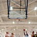 Devil dogs devour squids on court