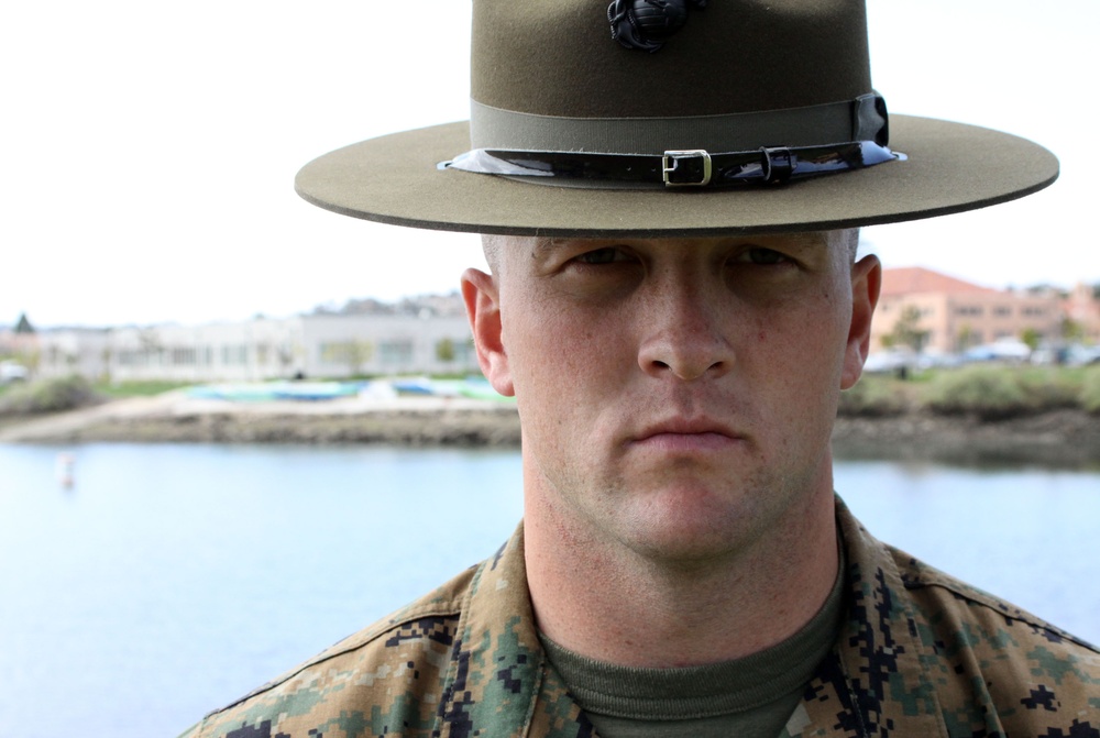 Company M drill instructor trains recruits, catches fish