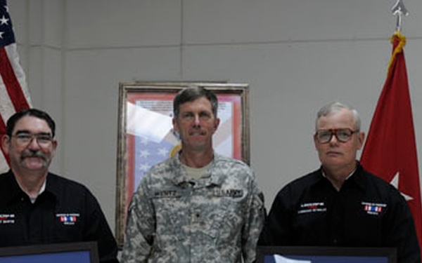 Civilian contractors receive Defense of Freedom Medal