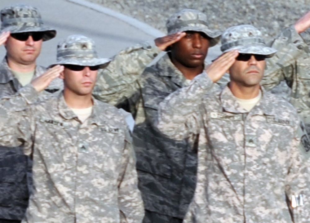 1-7 ADA Soldiers Participate in Deployed Retreat Ceremony